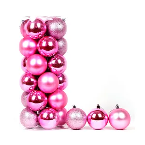 Close-up of 24 pink Christmas ornaments with shiny, matte, and glitter finishes