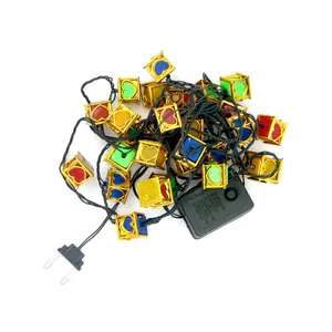 Colorful Christmas cube string lights with 8-function controller on a white background.