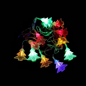 Close-up detail of multicolored glowing LED Christmas tree shaped fairy lights on black