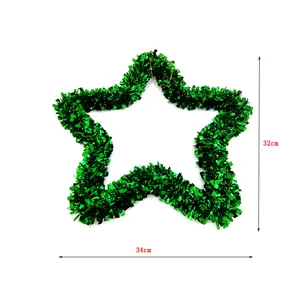 Detailed view of a green tinsel star-shaped Christmas wreath with dimension markers.