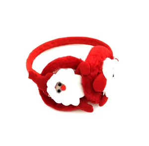 Detail view of plush red Christmas earmuffs with a cute Santa Claus character design.