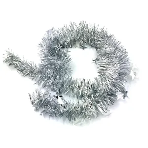 Shiny silver Christmas tinsel garland with stars for festive holiday party decoration.