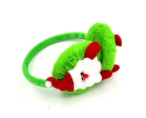 Detail view of fuzzy green Christmas earmuffs featuring a cute plush Santa Claus design.