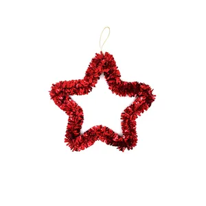 Detailed view of the red tinsel texture on a star-shaped Christmas ornament.