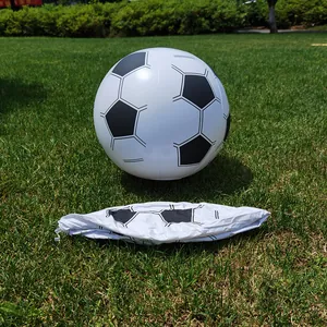 Inflatable soccer-patterned beach ball shown in both inflated and deflated states