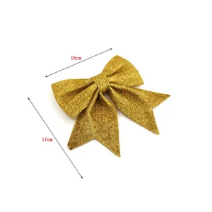 Maßdetail einer 16x17cm goldenen Glitzer-Weihnachtsschleife für die Baumdekoration