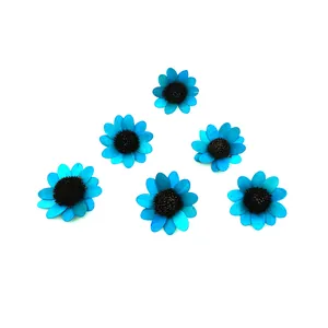 Detailed view of six blue wooden sunflower accessories for DIY handmade crafts.