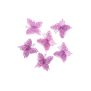 Close-up detail of purple glitter PVC butterfly ornaments for Christmas tree decoration