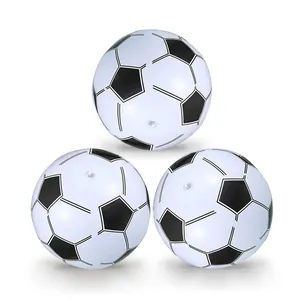 Detailed view of three inflatable soccer style beach balls for water play games