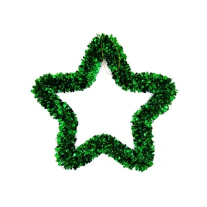 Detailed view of the 33cm green star-shaped tinsel wreath for festive decoration