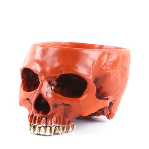 Close-up view showing the textured matte finish and detailed bone structure of the skull pot