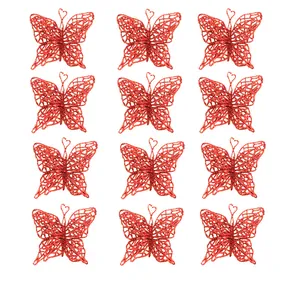 Macro view of twelve red glitter Christmas butterfly ornaments for DIY decorations.