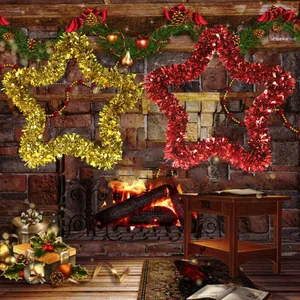 Details of 33cm gold and red tinsel star garlands displayed in a festive fireplace setting