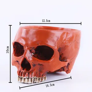 Halloween orange resin skull flower pot planter decoration with dimensions 16.5cm long