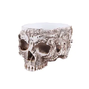 Intricate detail of a resin skull planter pot, perfect for gothic home decor and props