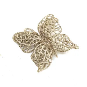 Detailed view of a golden glitter butterfly ornament for Christmas tree DIY