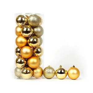 Detail view of 24-piece golden Christmas ball set with shiny, matte, and glitter finishes.