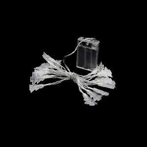 Close-up detail of battery-operated LED Christmas tree string lights for holiday decor