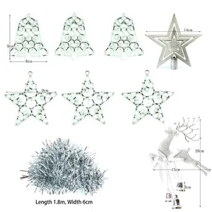 Detailed view of silver Christmas tree ornament set with stars, bells and tinsel