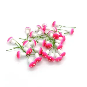 Detailed view of mini pink foam mushrooms on wires for micro landscape garden decor