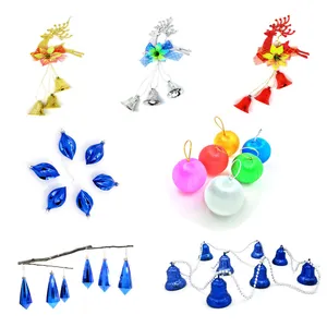Variety pack of colorful Christmas ornaments including reindeer, bells, and shiny balls