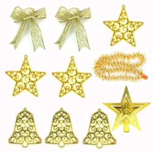 Complete gold Christmas tree decoration set with stars, bells, bows and tinsel garland