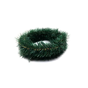 Detailed view of 5.5m green Christmas garland with gold accents for festive tree decor