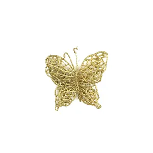Detailed view of a glittering gold butterfly Christmas tree ornament with mesh texture