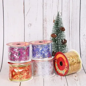 9m Christmas gold stamping ribbon rolls with star and musical patterns detail view