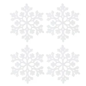 Detailed view of four white glitter acrylic snowflake ornaments for Christmas tree.