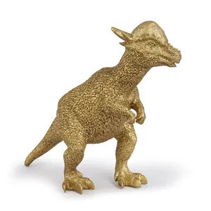 Detailed view of a golden Pachycephalosaurus dinosaur resin craft figurine for decor