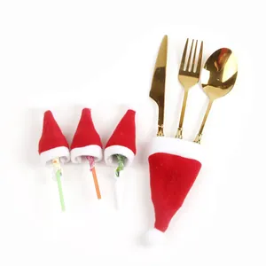Mini bonnets de Noël servant de porte-couverts dorés et décorations pour sucettes