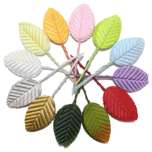 Close-up view of 12 colorful artificial rose leaves with wire stems for DIY floral crafts