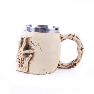 Close-up view of a gothic skull resin mug featuring a durable stainless steel inner liner