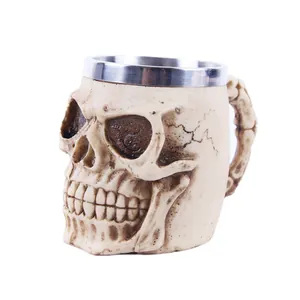 Close-up detail of gothic skull mug featuring realistic resin bone texture and steel liner