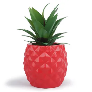 Decorative red pineapple resin planter with artificial green succulent for desk decor