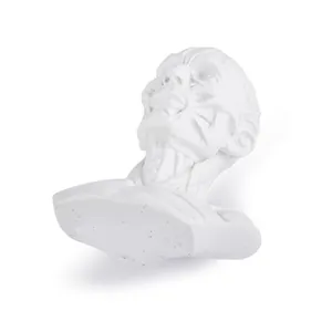 Detailed macro view of white resin human muscle anatomical bust for medical teaching.