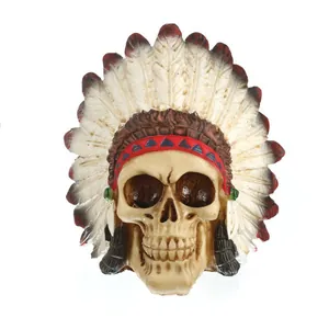 Detailed resin skull with a Native American style feather headdress for Halloween decor