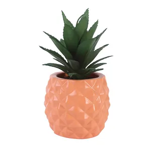 Detailed macro view of a decorative resin pineapple succulent pot for office desk ornament
