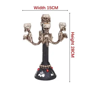 Candelabro gótico de resina con calaveras para Halloween, 28 cm de alto y 15 cm de ancho.