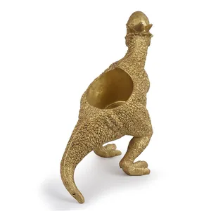 Back view of golden dinosaur resin planter showing the circular planting hole