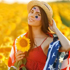 Close-up of USA flag temporary tattoo stickers on model face for festive celebration