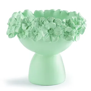 Creative light green succulent planter with detailed sculpted floral rim decoration