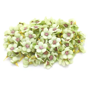 Confezione di mini teste di margherite in seta verde da 2 cm per decorazioni fai-da-te
