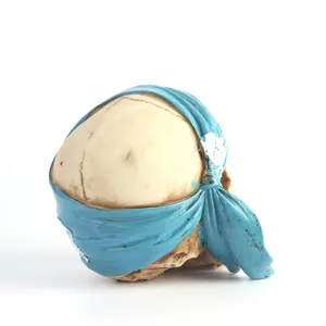 Detailed back view of resin pirate skull figurine with blue bandana Halloween decor