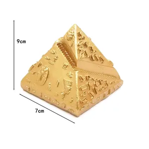 Golden Egyptian pyramid figurine with engraved hieroglyphs, 9x7cm dimensional detail view