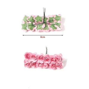 Detailansicht von 8 cm großen mini pinkfarbenen Papierrosen für Hochzeitsdekorationen