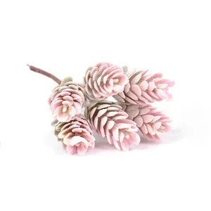 Close-up detail of artificial pink pinecone bouquet with realistic fuzzy flocked texture