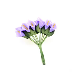 Detailed close-up of mini purple PU calla lily artificial flower bouquet for decor.
