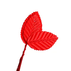 Detailed close-up view of vibrant red artificial rose leaves with wire stems for DIY crafts